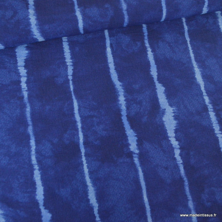 Tissu viscose bleu indigo à rayures effet tie and dye