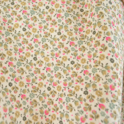Tissu double gaze de coton Caseille fleurs rose fluo fond écru