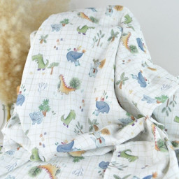 Tissu double gaze de coton Ceradino motif dinosaures fond à carreaux blanc