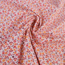 Tissu imperméable Caseille type ciré de pluie motif fleurs fond rose