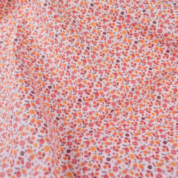 Tissu imperméable Caseille type ciré de pluie motif fleurs fond rose