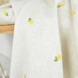 Tissu viscose lin brodé citrons jaunes - fond sable