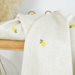 Tissu viscose lin brodé citrons jaunes - fond sable