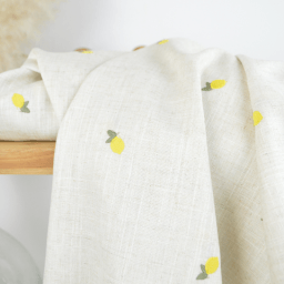 Tissu viscose lin brodé citrons jaunes - fond sable