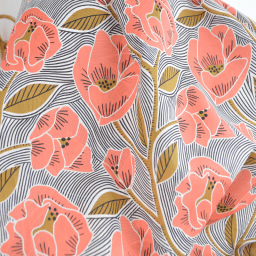 Tissu voile de coton motif fleurs corail et ocre fond rayé