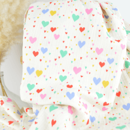 Tissu double gaze de coton Tiamo motif coeurs dond écru