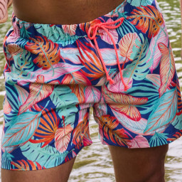 Tissu pour short de bain déperlant motif feuilles exotiques