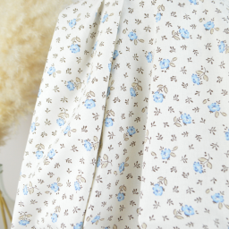 Tissu Cretonne de Coton Olympe motif fleurs bleues fond ecru