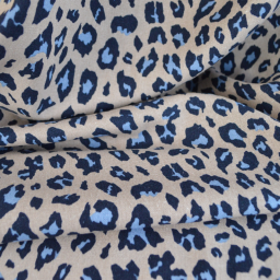 Tissu viscose lin motif léopard bleu fond beige