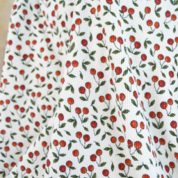 Tissu jersey côtelé motif cerises fond blanc cassé