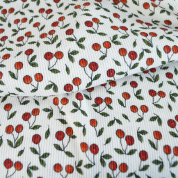 Tissu jersey côtelé motif cerises fond blanc cassé