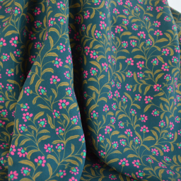 Tissu popeline de viscose motif petites fleurs roses fond vert