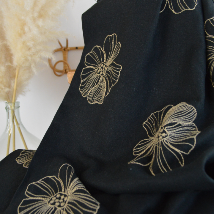 Tissu viscose lin motif fleurs sables fond noir