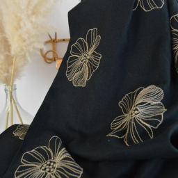 Tissu viscose lin motif fleurs sables fond noir