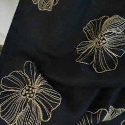 Tissu viscose lin motif fleurs sables fond noir