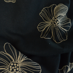 Tissu viscose lin motif fleurs sables fond noir