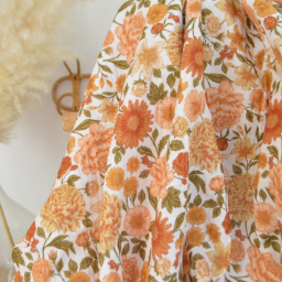 Tissu double gaze de coton Elisabeth motif fleurs tons orangés et rose