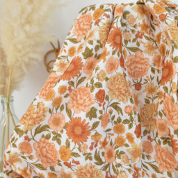 Tissu double gaze de coton Elisabeth motif fleurs tons orangés et rose