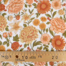 Tissu double gaze de coton Elisabeth motif fleurs tons orangés et rose