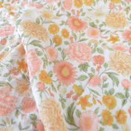 Tissu double gaze de coton Elisabeth motif fleurs tons roses et Abricot