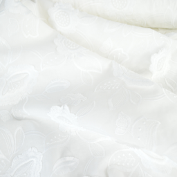 Tissu coton brodé blanc cassé à fleurs frangées