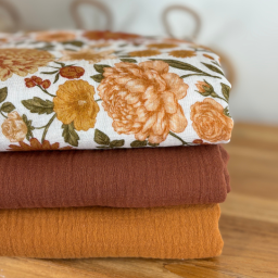 Tissu double gaze de coton Elisabeth motif fleurs tons orangés et rose
