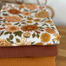 Tissu double gaze de coton Elisabeth motif fleurs tons orangés et rose