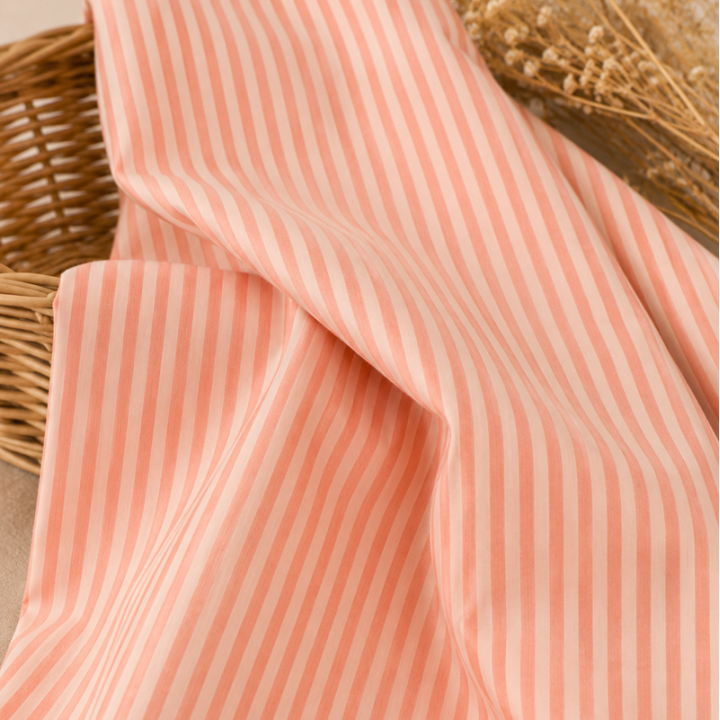 Tissu seersucker à rayures larges - Corail et Nude