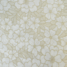 Tissu voile de coton brodé beige motif fleurs fond sable