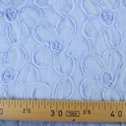 Tissu coton à ratyures Octave motif fleurs en relief