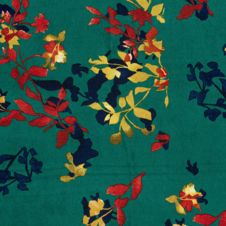 Tissu Satin peau de pêche motif fleurs fond vert éclatant