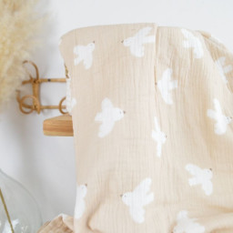 Tissu double gaze motif oiseaux blancs fond beige - OEKO TEX