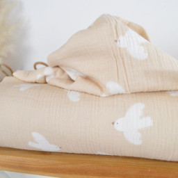 Tissu double gaze motif oiseaux blancs fond beige - OEKO TEX