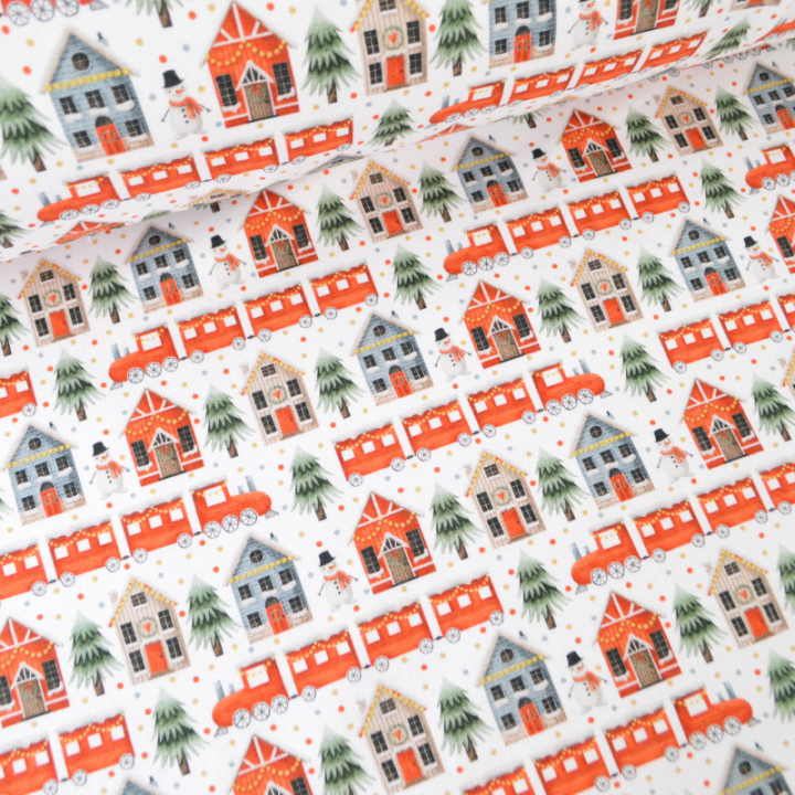 Tissu Sweat molleton de Noël motifs maisons et sapins rouge fond blanc