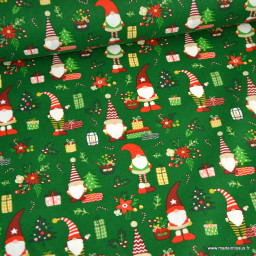 Tissu cretonne coton de Noël motif lutins fond vert - Okeo tex