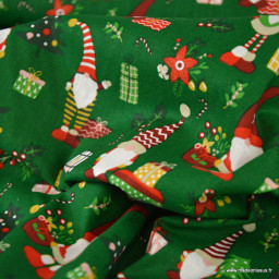 Tissu cretonne coton de Noël motif lutins fond vert - Okeo tex