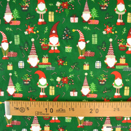 Tissu cretonne coton de Noël motif lutins fond vert - Okeo tex
