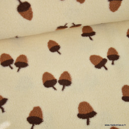 Tissu sherpa écru motif glands camel et chocolat