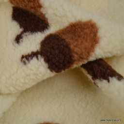 Tissu sherpa écru motif glands camel et chocolat