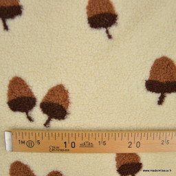 Tissu sherpa écru motif glands camel et chocolat