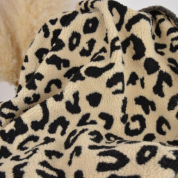 Tissu sherpa motif léopard fond écru
