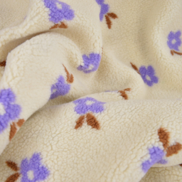 Tissu sherpa écru motif fleurs parme fond écru