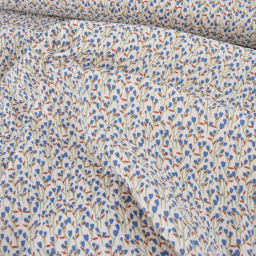 Tissu double gaze de coton Diletta motif fleurs bleues fond latté