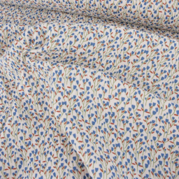 Tissu double gaze de coton Diletta motif fleurs bleues fond latté