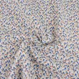 Tissu double gaze de coton Diletta motif fleurs bleues fond latté