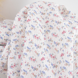 Tissu double gaze de coton Marthe motif fleurs fond blanc cassé