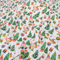Tissu cretonne coton de Noël motif gnomes fond blanc - Okeo tex
