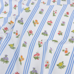 Tissu Borie en coton motif fleurs et rayures bleues fond blanc - OEKO TEX