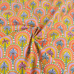 Tissu cretonne coton Amaya motif palmiers graphiques jaune safran et orange