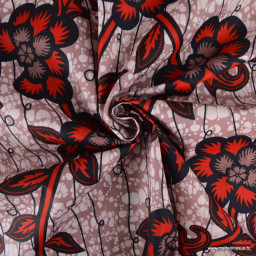 Tissu wax coton Zola Fleurs rouges sur fond rose poudré